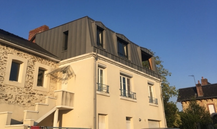 Sur&eacute;l&eacute;vation d'une charpente